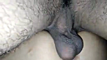 Man inserts dick into wife's filled anus and cums