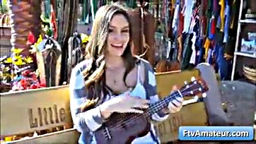 Summer flaunts massive tits while strumming ukulele