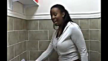 Woman pees in bathroom, sans underwear