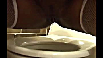 Sexy black woman pees on camera, gets naughty