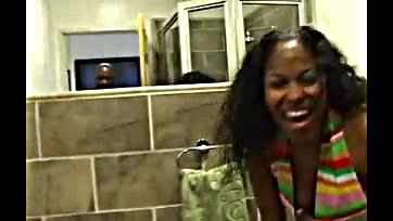 Sexy black woman pees on camera, gets naughty