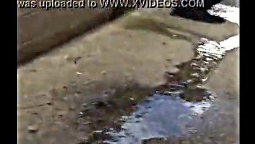 Two chicks gotta take a desperate piss on the sidewalk