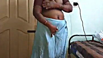 Indian wife shows off breasts, pubic area in grey saree