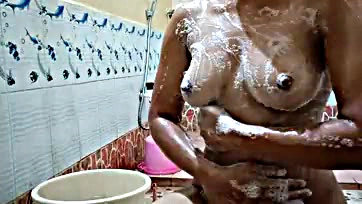 Indian wife fingers herself in hot shower, talks dirty