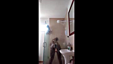 Girl drops dildo in shower, gets shocked and laughs