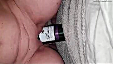 Wife gets drunk, wanks with wine, gives sloppy blow