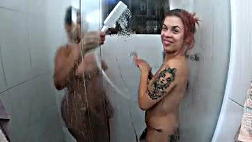 A woman gave a blow job in the shower