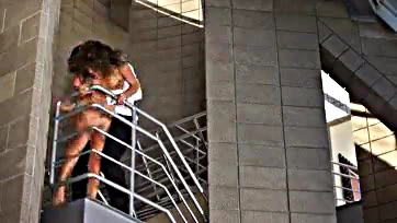 Girl gets spanked and fucked on the balcony