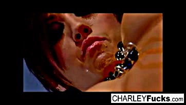 Charlie gets sloppy with a sultry, seductive brunette