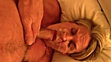 Mature woman gets massive facial, swallows cum, orgasms