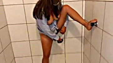 Madrastra masturbates with large dildo in bathroom