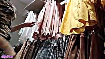 Woman gets caught in dressing room during oral sex