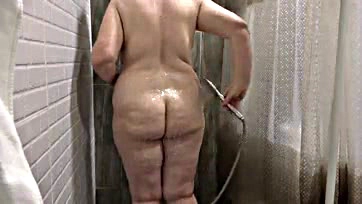 Chubby milf's shower cam captures explicit mature wife content