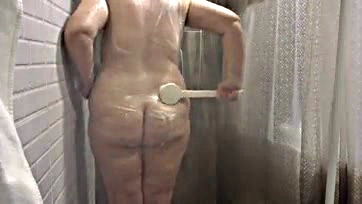 Chubby milf's shower cam captures explicit mature wife content