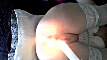 Woman has candles in vagina and anus