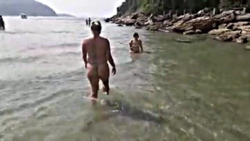 Three women seek a well-endowed man on the beach