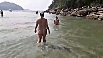 Three women seek a well-endowed man on the beach