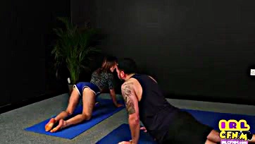 Asian woman performs explicit yoga moves on male partner