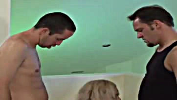 A blonde gets double-pumped and cummed on