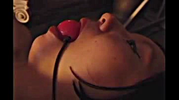 Asian submissive receives hot wax and bondage