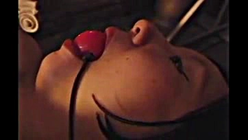 Asian submissive receives hot wax and bondage