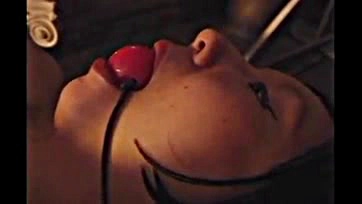 Asian submissive receives hot wax and bondage