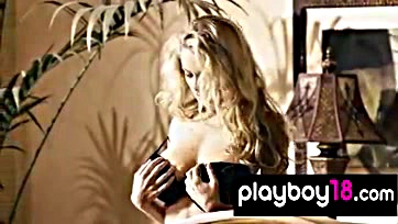 Teen blonde plays with huge, natural tits