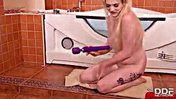 Girl masturbates intensely, resulting in explosive orgasm