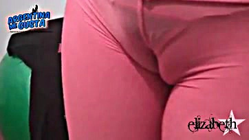 Large breasts, camel toe, and rounded buttocks are prominent