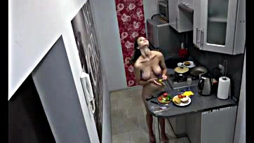 Teen girl cooks naked in home, gets caught on cam