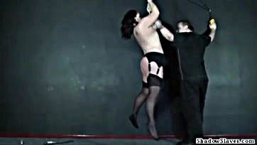 Whipped slavegirl's massive tits get brutal punishment