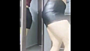 Sexy spy cam captures tight skirt's juicy butt