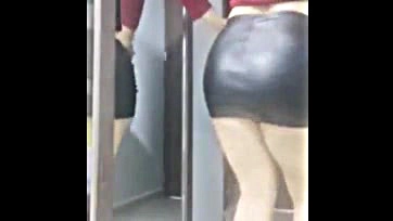 Sexy spy cam captures tight skirt's juicy butt