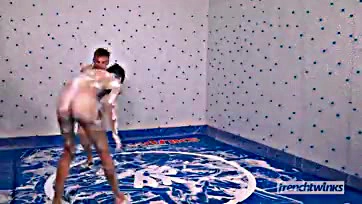 Two dudes get naked and soap-fight each other