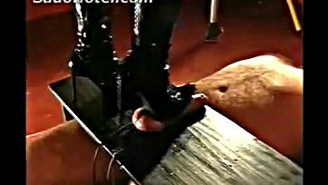 Male slave's genitals crushed by dominant female