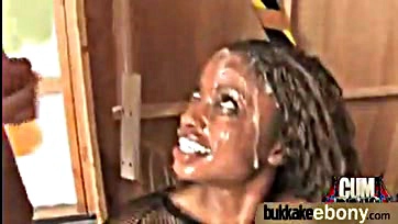 Black woman receives massive cumshot on her facial features