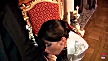 Naughty brunette sucks priest's cock at church