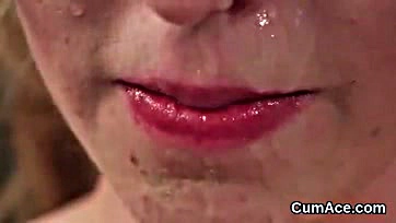 Girl gets covered in cum while eating semen