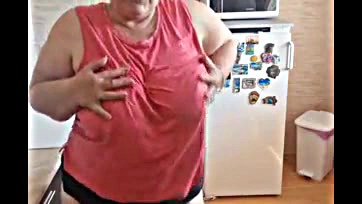 Mature BBW flaunts massive breasts