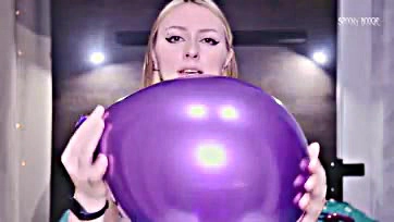 Brunette gets off on popping balloons, self-touching, and cumming