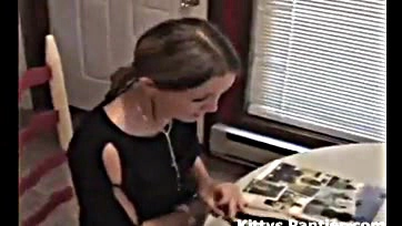 Teen flashes her thong while reading a mag