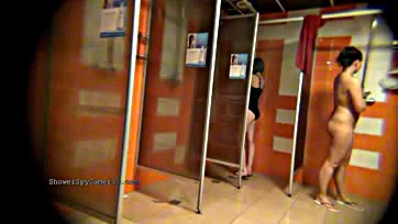 Peek at granny's hairy snatch in public toilet