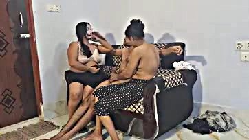 Three people engage in a Bengali sexual encounter