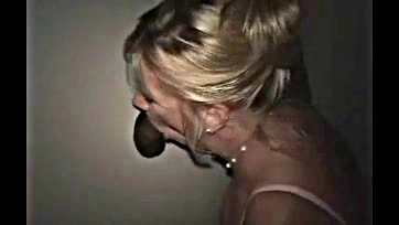 White wife sucks black cock at glory hole