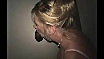 White wife sucks black cock at glory hole