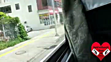 Asian woman orally pleasured BeltFedBandit on a bus