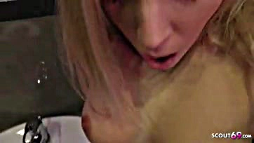 A teenage blonde has amateur sex with a German