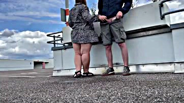 Sexy mom publicly pees in a parking lot