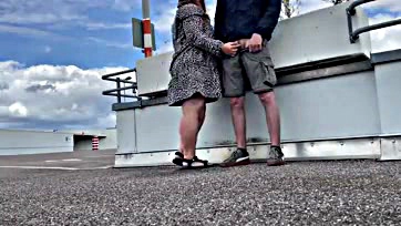 Sexy mom publicly pees in a parking lot