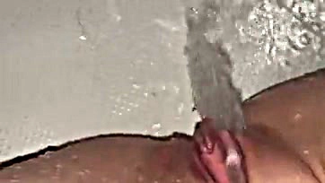 Water-jet solo pleasure in bathroom, explicit